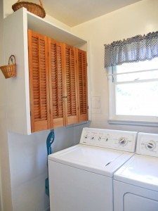 Alternate view of laundry room with more storage (washer and dryer are included).