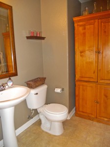 Convenient downstairs guest half bath -- armoire stays with the house! 18894 Chatfield Dr., Riverside