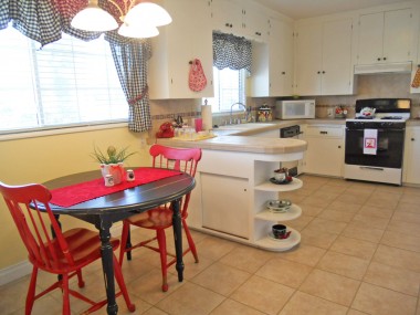 View of entire kitchen, including breakfast nook.