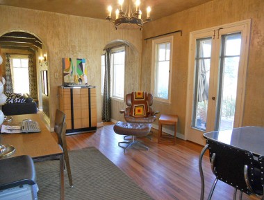 Formal dining room with original hardwood floors, original chandelier, and French doors that lead to a deck that overlooks the huge backyard and year-round view of Mt. Rubidoux. 3105 Pine St., Riverside