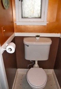 Alternate view of downstairs half bath. Original tile floor and paper holder. Very charmin... er, charming!! 3105 Pine St., Riverside