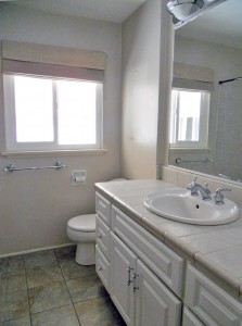 Updated full hallway bathroom with newer window and tile floor. There's a shower in tub combo. 4734 Rubidoux Ave., Riverside