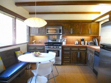 Updated eat-in kitchen with under cabinet lighting, built-in microwave, dishwasher, and enormous pantry, plus a dry bar and two separate outdoor eating areas. 3105 Pine St., Riverside