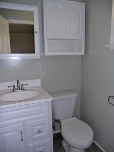 Private master 3/4 bathroom with newer tile floor, window, vanity, medicine chest and toilet. 4734 Rubidoux Ave., Riverside