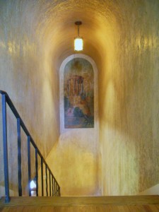 Original painted mural by European-trained artist, Carl Ruhnau, is showcased in the coved ceiling of the stairway. 3105 Pine St., Riverside