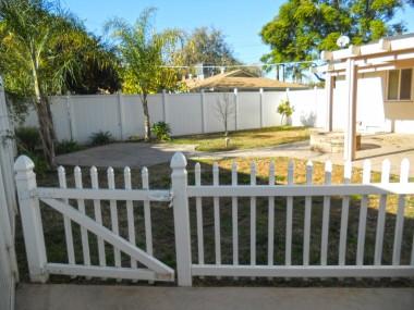 View of backyard from fenced dog run. 4734 Rubidoux Ave., Riverside