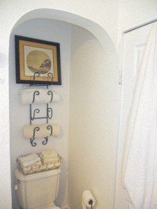 Original and charming rounded ceiling entrance to water closet. 4081 Larchwood Pl., Riverside