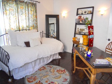 Front bedroom with original hardwood floors, sconce lighting and double-paned windows. 4081 Larchwood Pl., Riverside