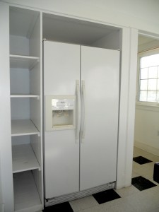 Refrigerator flush with built-in shelving.