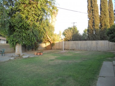 Large backyard -- enough room for pool and swing set, toys, etc.