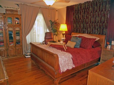 One of three large bedrooms.