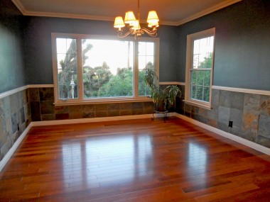 Gorgeous formal dining room with sky-high view of Riverside.