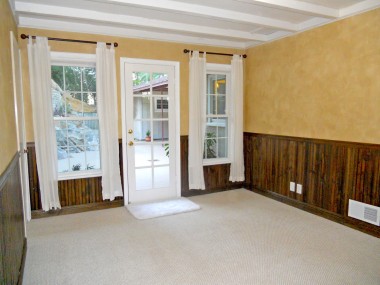 One of three bedrooms -- this one with attached remodeled private 3/4 bathroom.
