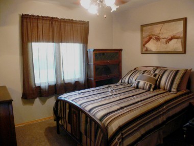 One of three carpeted bedrooms.