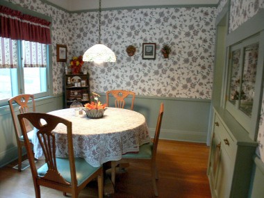 Ultra charming breakfast nook with original hardwood floors and built-in China hutch.