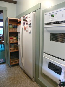Pull-out spice rack, newer refrigerator and double oven.  A cook's dream!