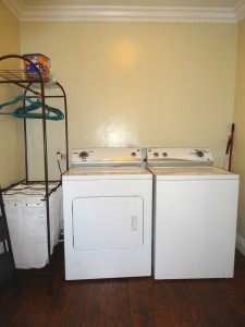 Separate indoor laundry room. 