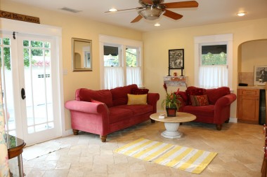 Alternate view of family room with French doors leading to the private back yard.