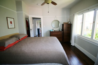 Master bedroom with walk-in closet and private half bath.
