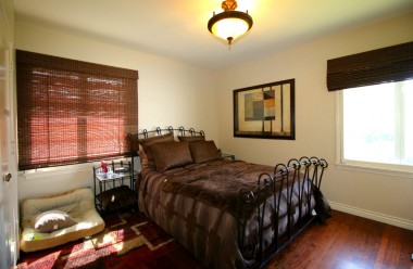 Master bedroom with refinished hardwood floors.