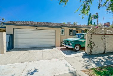 In addition to the spot where the vintage truck is parked, and the 2-car garage (with workshop), there is also another gated parking area to the left of garage which could be used for another vehicle or two, a boat, or a smaller RV.
