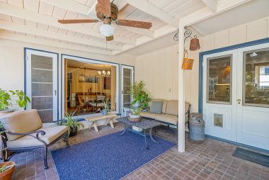 Covered patio just off the kitchen which is ideal for Al fresco dining year-round!