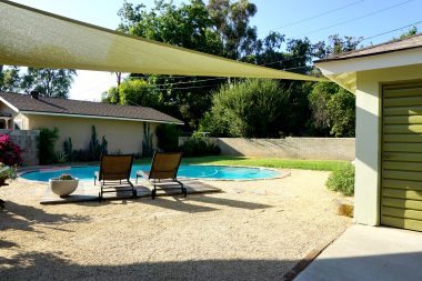 Gorgeous inground pool, lovely spacious yard, and detached 2-car garage.