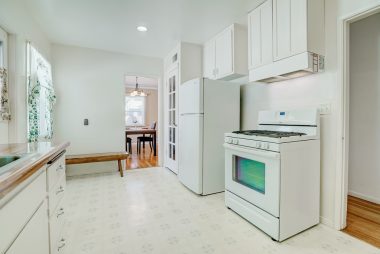 Alternate view of kitchen with walk-in pantry and area for breakfast table/chairs. All appliances are included.