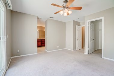 Alternate view of master bedroom with walk-in closet.