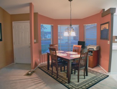 Formal dining area and front entrance.