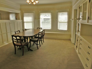 The extra large formal dining room with window seat and built-in China hutch will accommodate large family gatherings!
