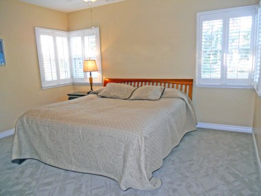 This is one of the large secondary bedrooms -- keep in mind this is a king-size bed!