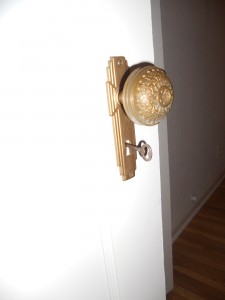 Many original door knobs with attached skeleton keys.
