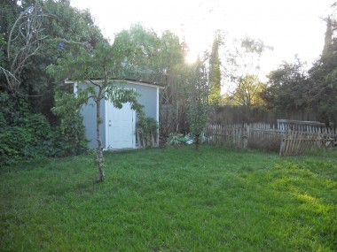 Spacious back yard could accommodate a pool with space left over for a garden.