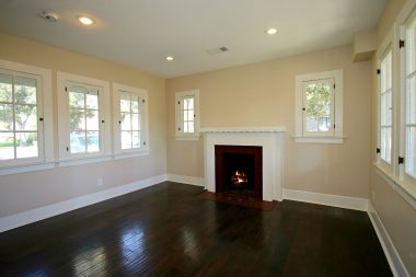Family room with second fireplace which could also double as dining area. Lots of natural light, along with recessed ceiling lights.