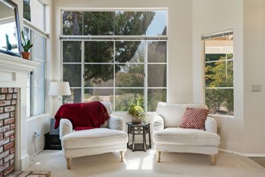 Lots of natural light flowing into this tranquil reading area overlooking the hummingbird-filled front yard.