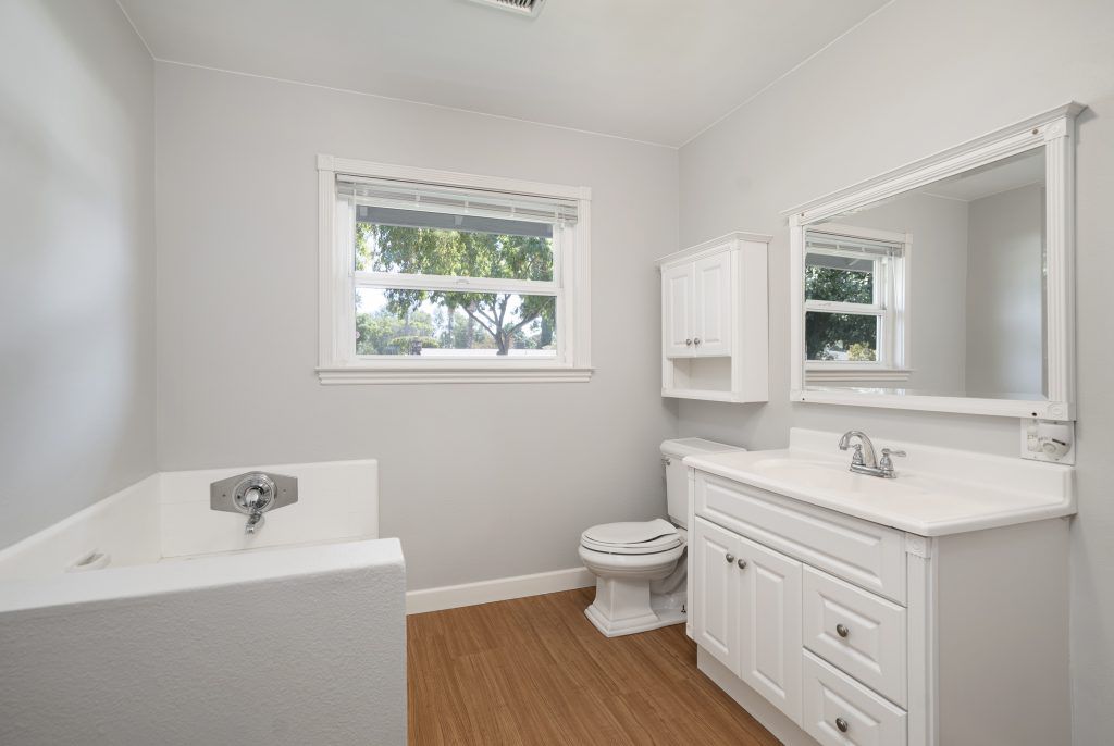 Hallway bathroom freshly painted. The Glatzel Sister Team