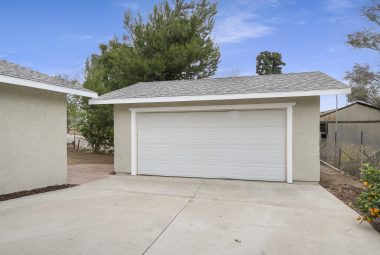 In addition to the carport, enjoy a detached full 2-car size garage that is only 15 yrs old, with a roll up door too.