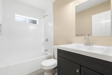 Fully remodeled bathroom. Brand new tub, new tile surround, new flooring, new vanity, new paint, new toilet. ALL NEW!