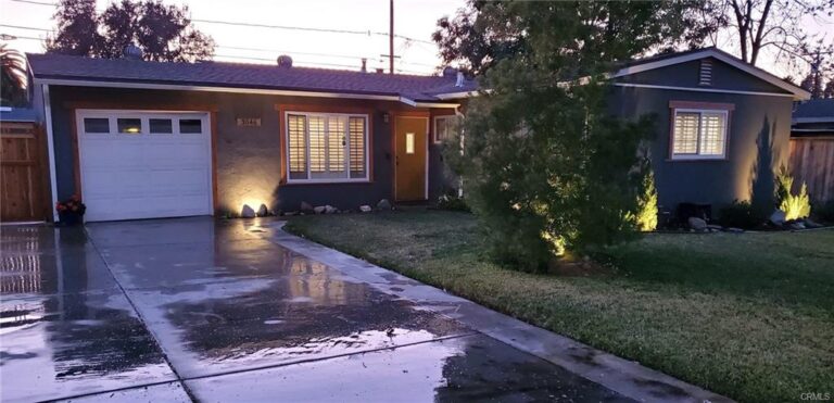 Twilight shot of 3046 David Street, Riverside CA 92506 with accent lighting.