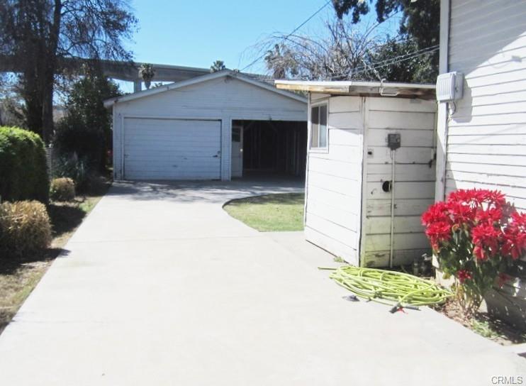 Unit #2 -- driveway to garage and carport