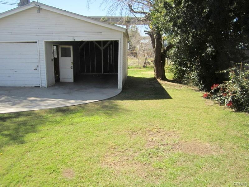 Unit #2 -- backyard and garage/carport