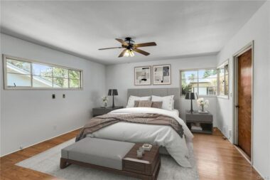 Virtually staged primary bedroom suite with exterior door to the backyard for separate if needed.
