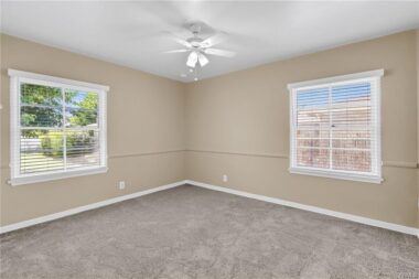 Bedroom #1 with new carpeting, paint, and window coverings