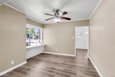 Formal dining room with doorway to eat-in kitchen
