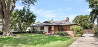 Curb appeal and long gated driveway with additional parking behind the gate, along with a detached oversized garage. Car enthusiasts or hobbyists will be so happy with all the space back there!