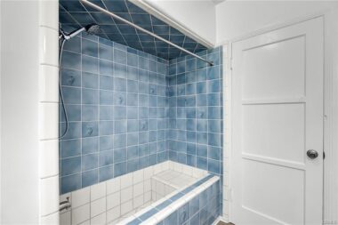 Shower in tub.
