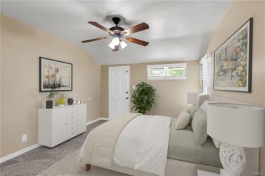 Virtually staged Bedroom #2 with new carpet, paing, and window coverings