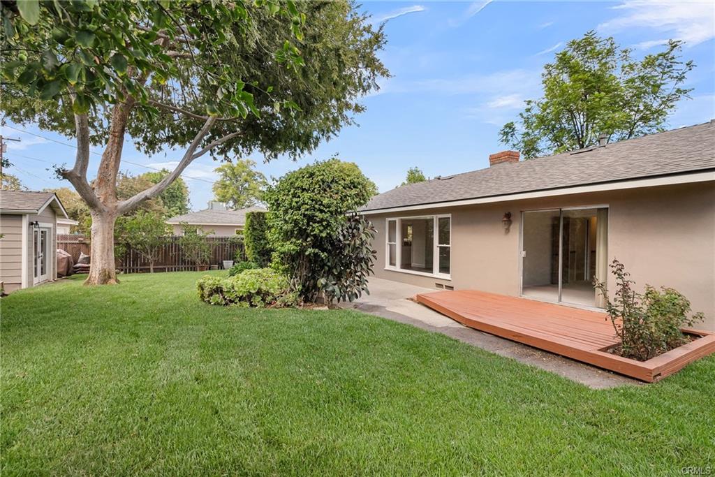 Gorgeous and lushly landscaped backyard with room for a small pool and/or an ADU. Mature shade trees, brand new wood fence on one side of the yard which could also be turned into a dog-run if needed. There is also a 220 hookup on the back patio for a spa.