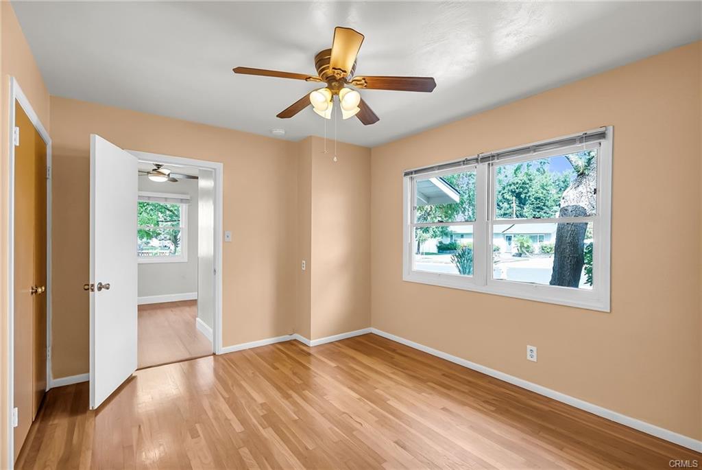 Alternate view of Bedroom #1 with doorway to kitchen and 3/4 bathroom access.